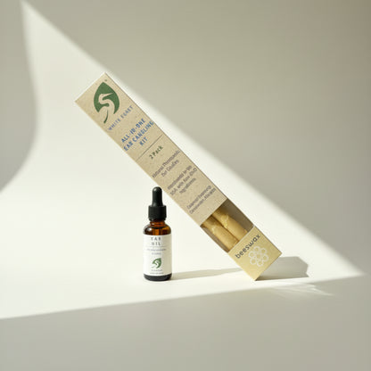 Box of Beeswax Ear Candles and bottle of ear oil