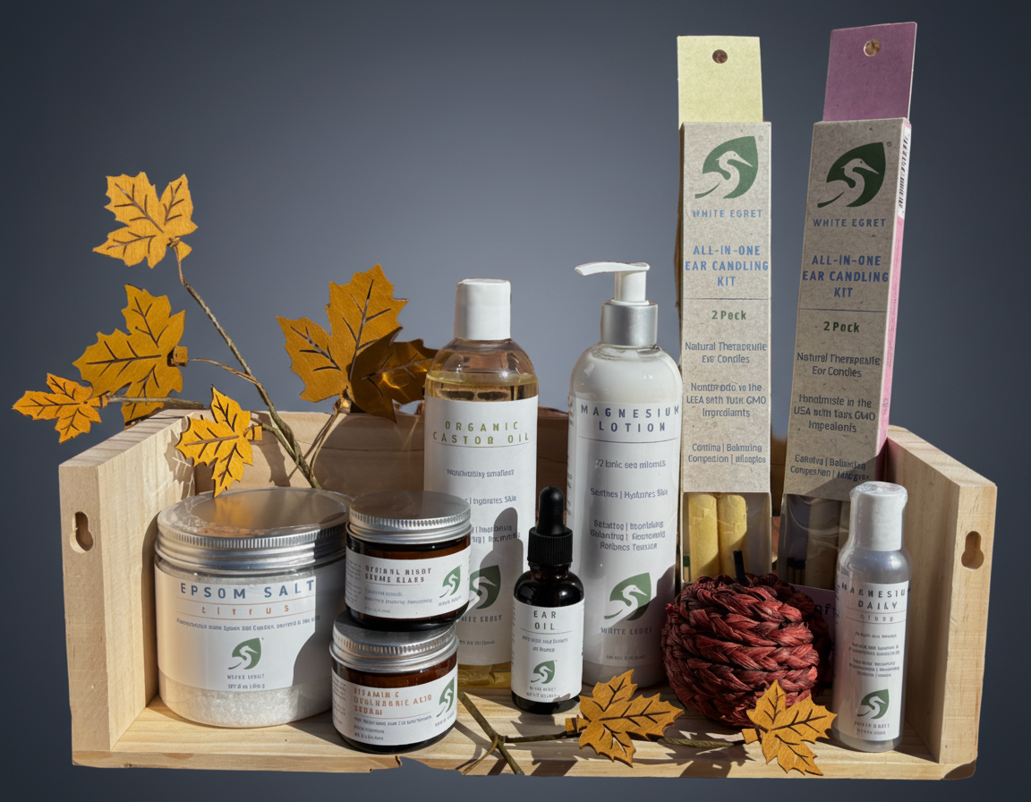 Collection of natural skincare products in a wooden box with decorative elements on a white background